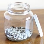Line the bottom with decorative rocks