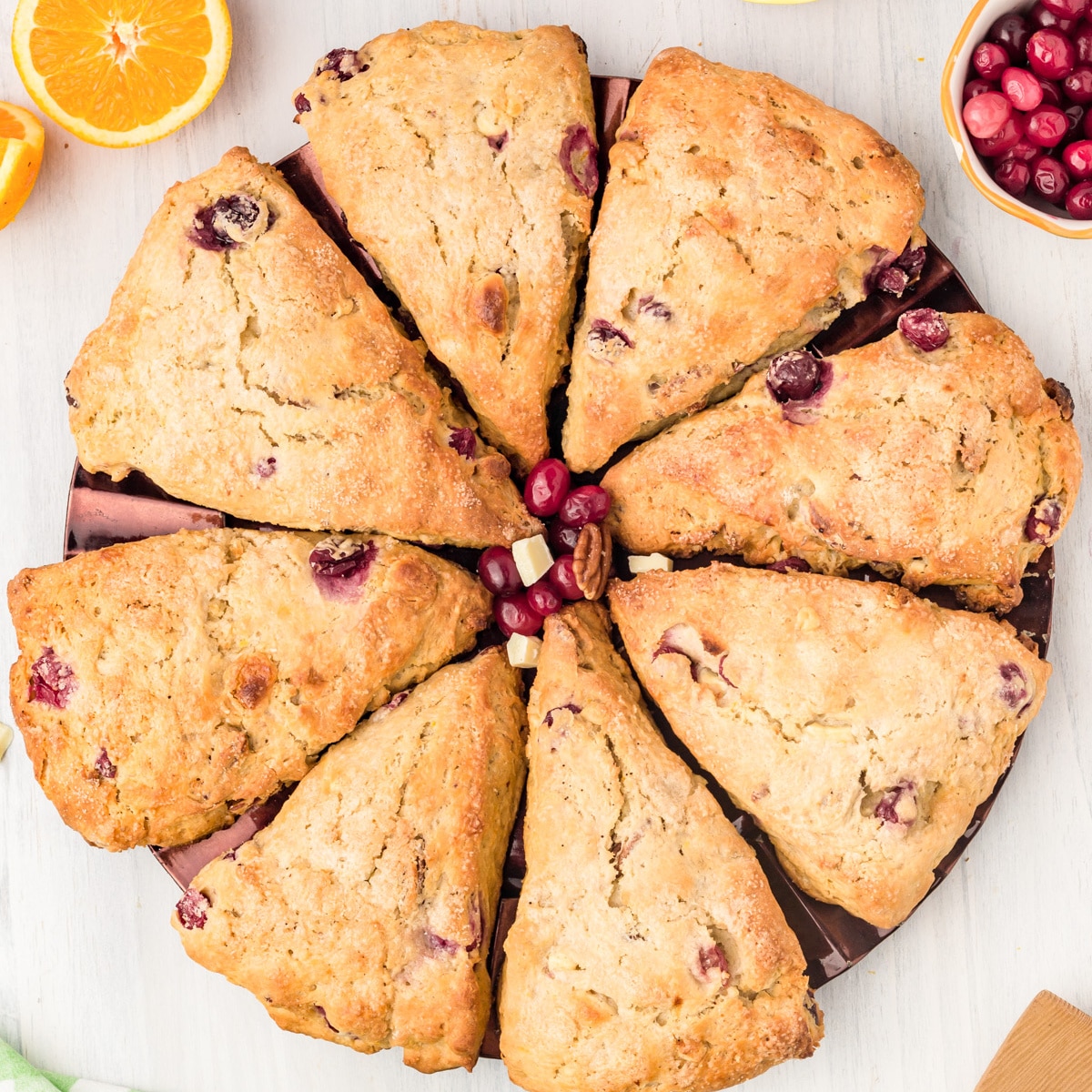 Overhead of cranberry scones in a circle.
