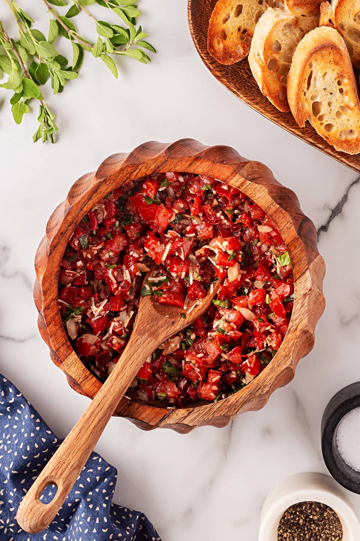 This Best Tomato Bruschetta recipe will have you making it all year round. The flavors are perfectly balanced and one that I get rave reviews from. Finished tomato topping.
