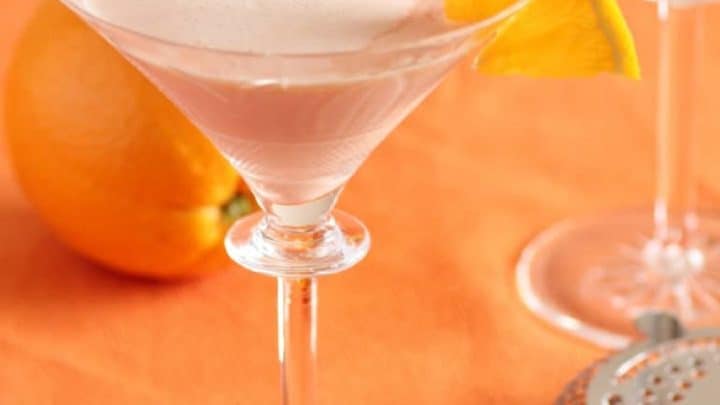 creamsicle cocktail in a martini glass