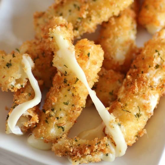 Mozzarella Cheese Sticks showing their ooey gooey interior