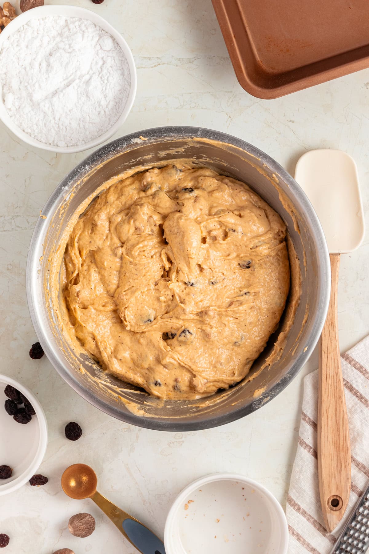 Raisins and chopped walnuts incorporated to the pumpkin batter.