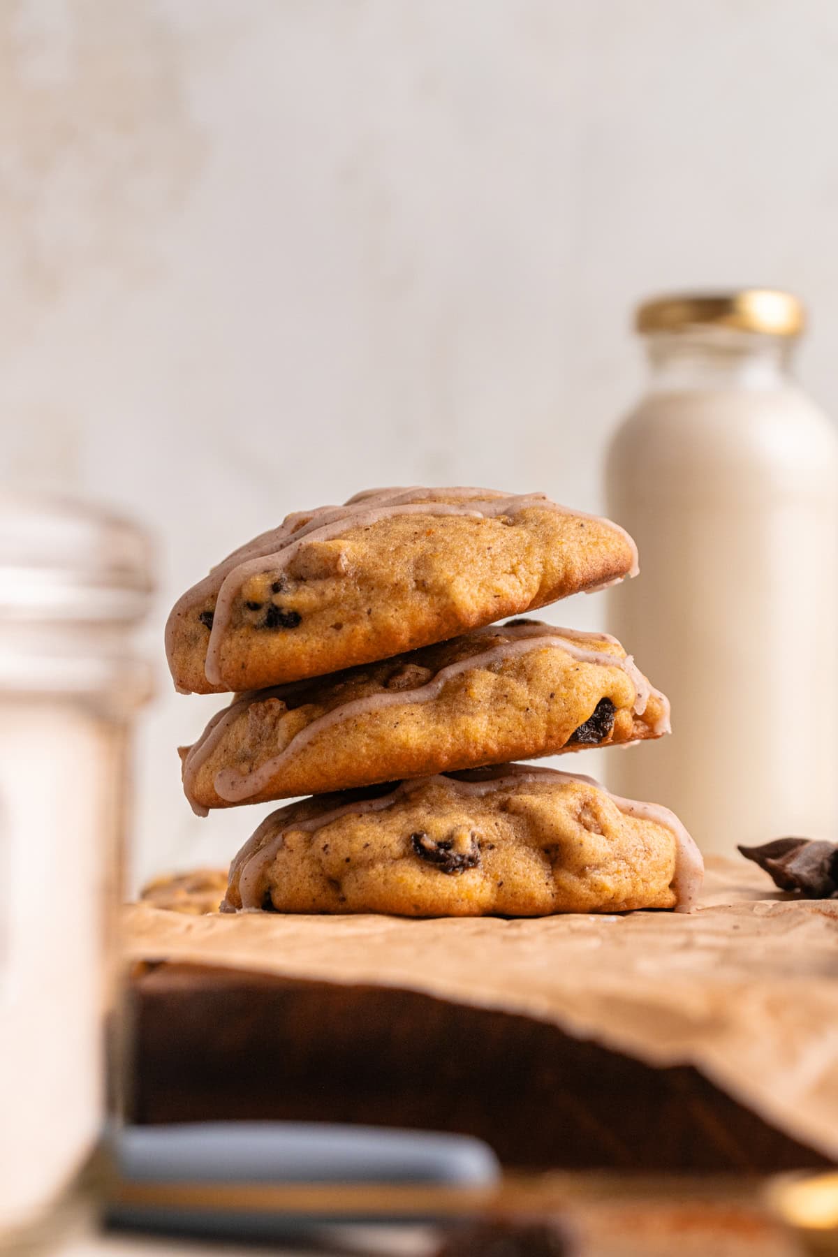 Pumpkin cookies on a wooden board.