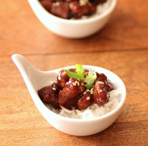 Pork Tenderlin Tid Bits over rice in a small white individual serving bowl