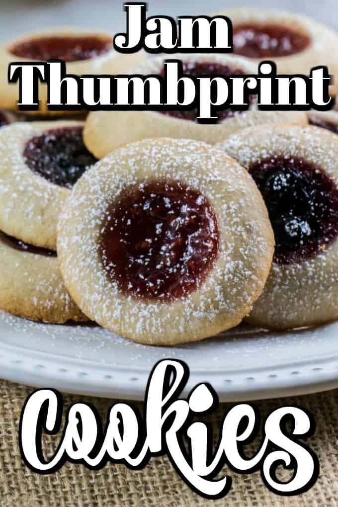 Lemon Raspberry Jam Thumbprint Cookies are the perfect buttery shortbread treat that everyone will love to indulge in over the holiday season and beyond!! #thumbprints #jam #cookies