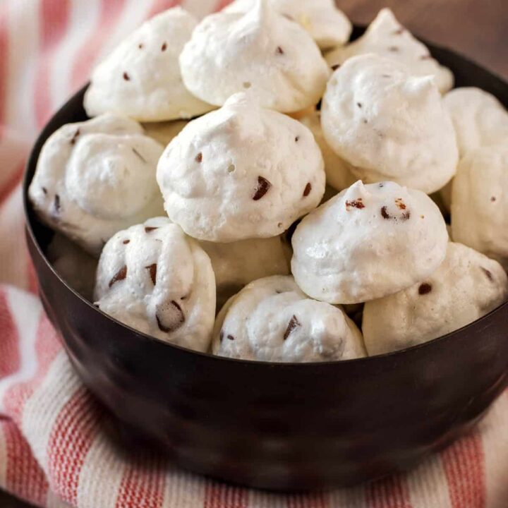 Mini Chocolate chip meringue cookies in a small black bowl
