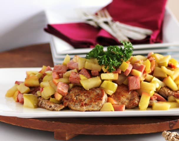 Michael Symon's Pork and Apple Scallopini on a white serving platter