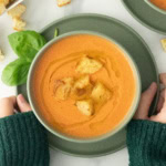 Grabbing a bowl of soup.