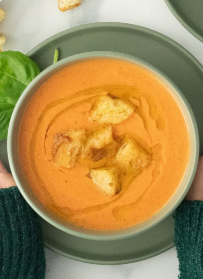 Grabbing a bowl of soup.
