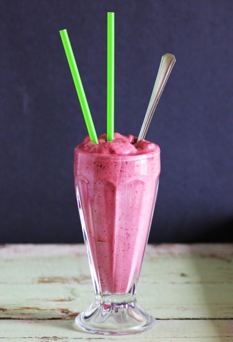 Lemon Blackberry Smoothie in a soda glass with 2 straws