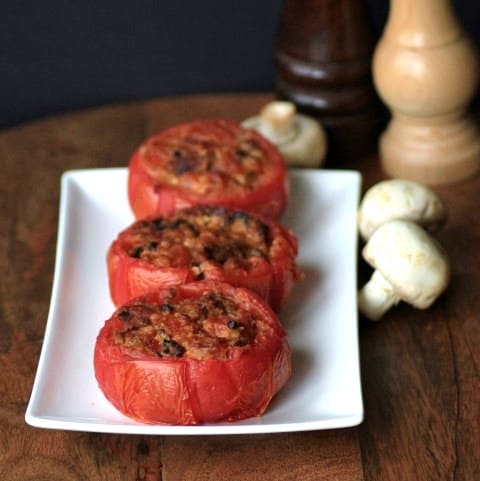 Stuffed Smoked Tomatoes on a white serving platter