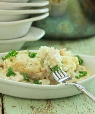 Quick Chicken and Dumplings in an oval serving dish and fork