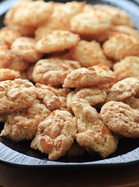 Cornflake Macaroons cookies on a black tray