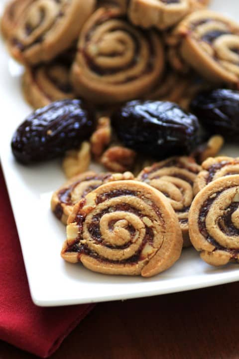 Swirl Cookies on a white plate with dates