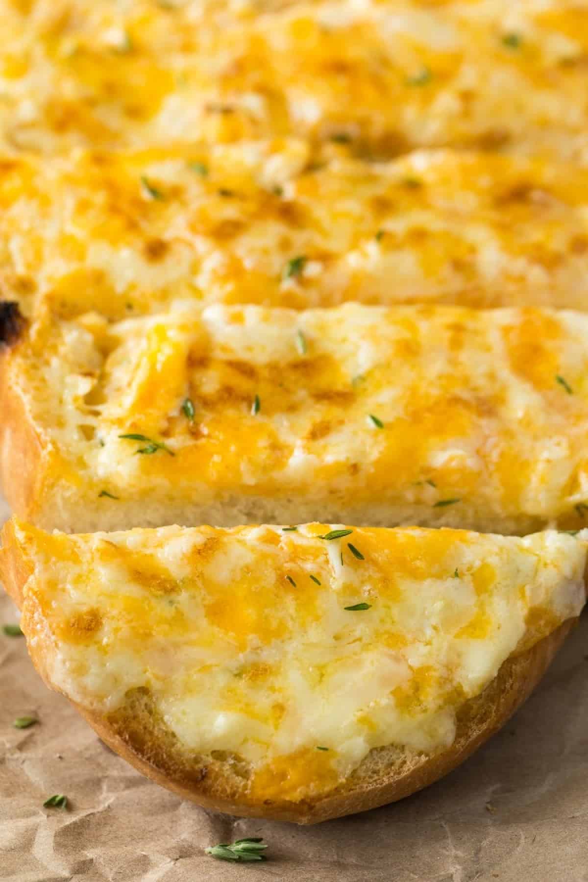 Close-up of sliced cheese bread. 