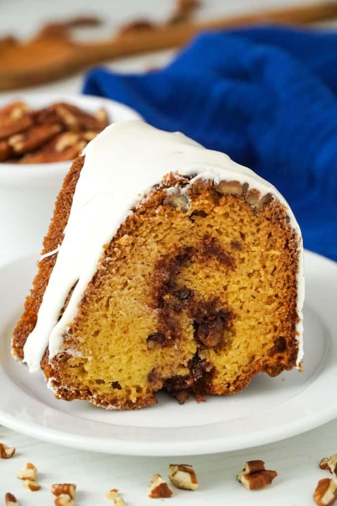 A slice of Cinnamon Roll Bundt Cake on a plate