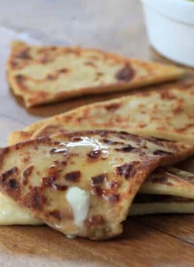 Potato scones wedges covered with butter.