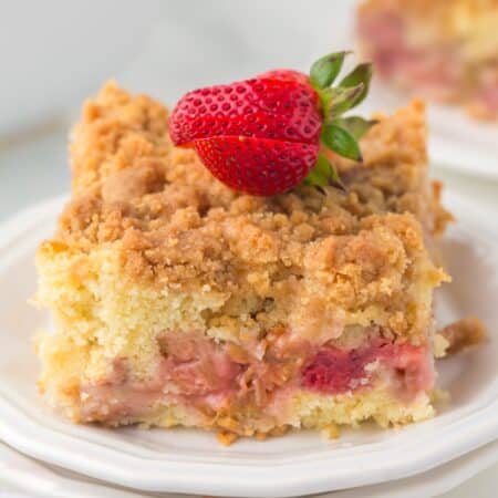 Square of cake on a plate.