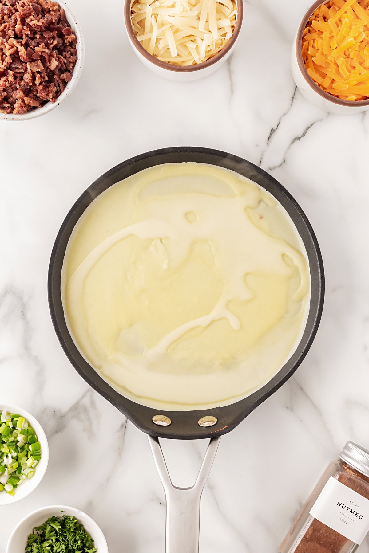 This recipe for Crepes Lorraine is a time-honored treasure that I have been making for over 40 years. Friends and family love this recipe, and I am thrilled to offer it to you also. Cooking a crepe.