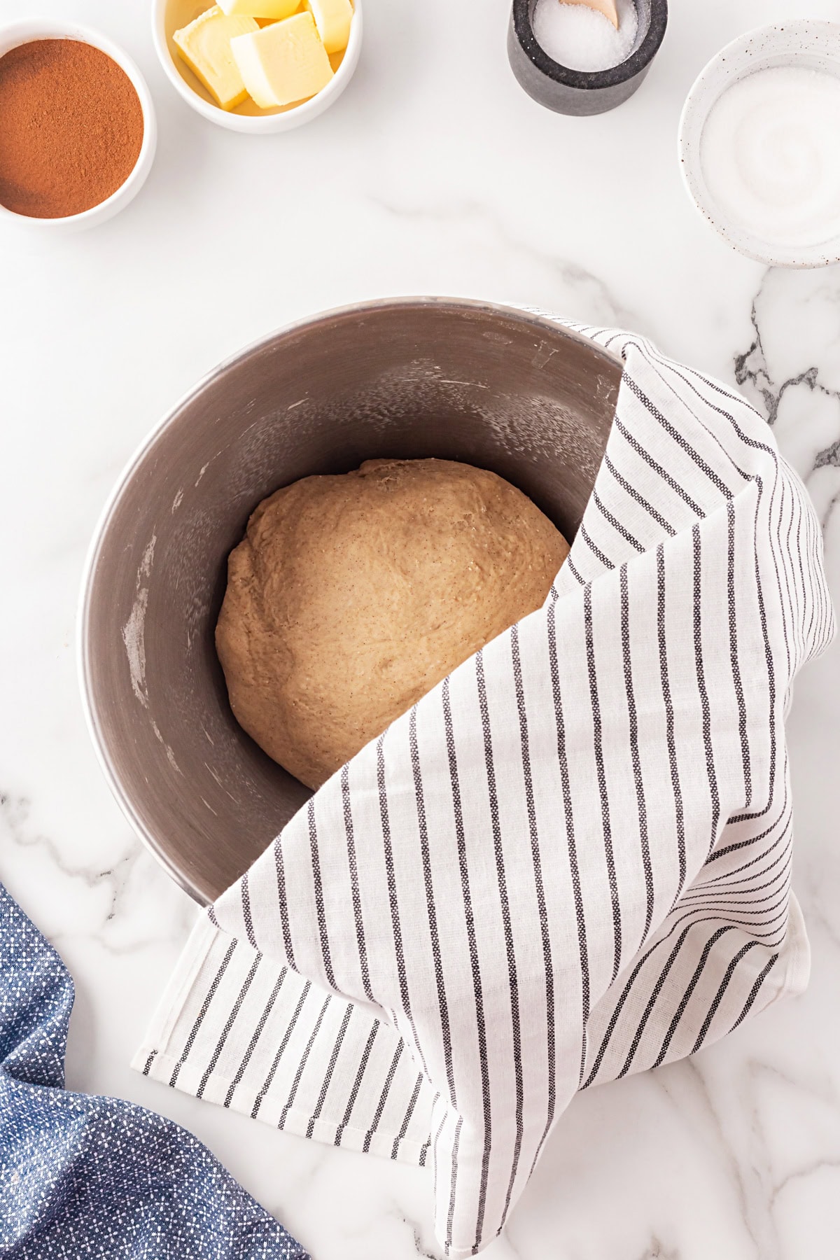 This Cinnamon Swirl Bread is one of the best homemade breads you can make. The bread is light and fluffy, with an amazing cinnamon swirl that you will be addicted to. Dough in bowl.