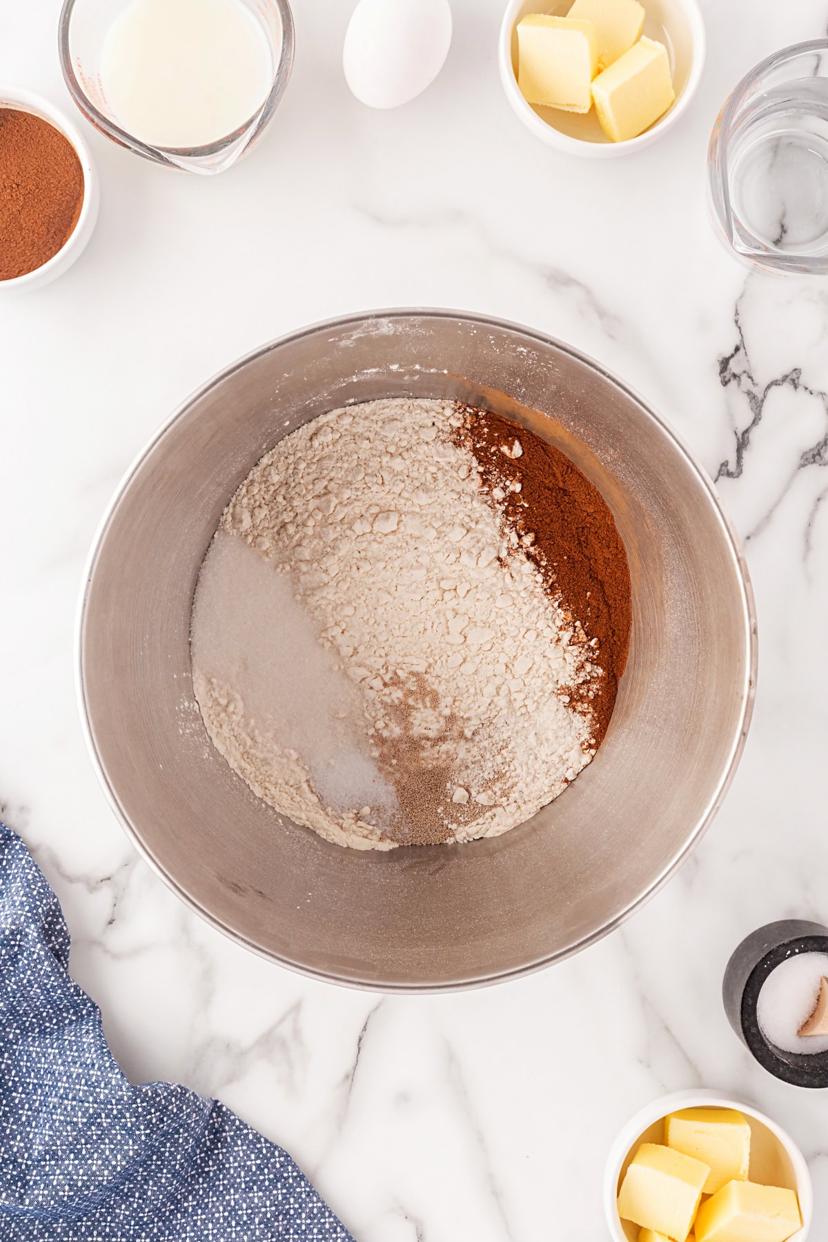 This Cinnamon Swirl Bread is one of the best homemade breads you can make. The bread is light and fluffy, with an amazing cinnamon swirl that you will be addicted to. Dry ingredients in a bowl.