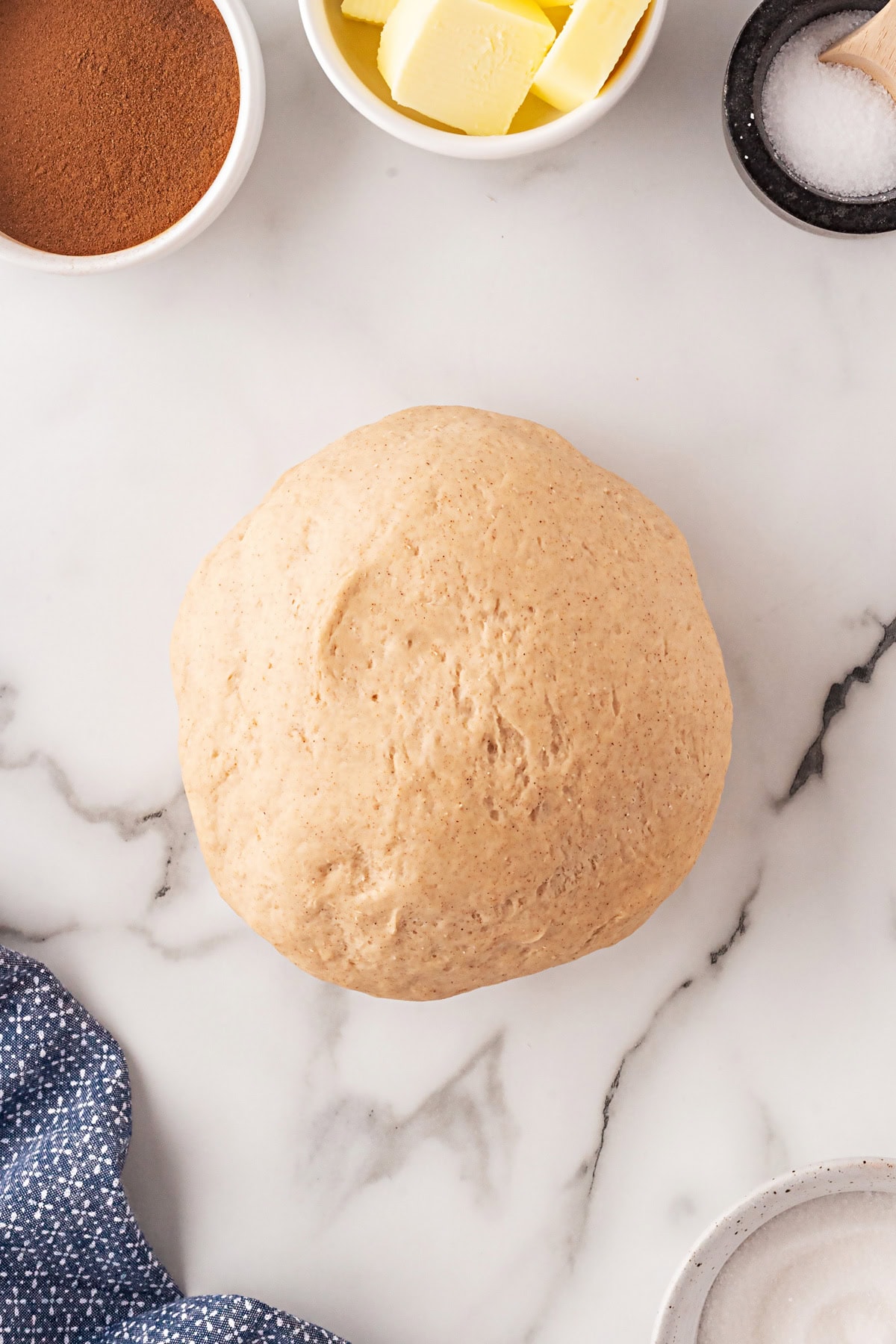 This Cinnamon Swirl Bread is one of the best homemade breads you can make. The bread is light and fluffy, with an amazing cinnamon swirl that you will be addicted to. Dough risen on the counter.