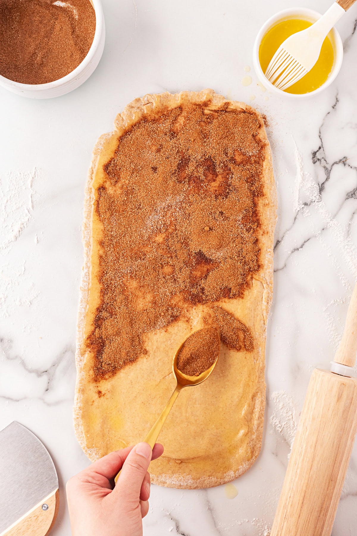 This Cinnamon Swirl Bread is one of the best homemade breads you can make. The bread is light and fluffy, with an amazing cinnamon swirl that you will be addicted to. Sprinkling with the cinnamon mixture.
