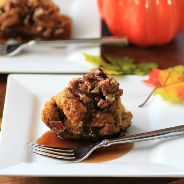 Tipsy Pumpkin Bread Pudding on white plates