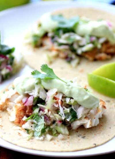 Avocado Cream Slaw Fish Tacos hero.