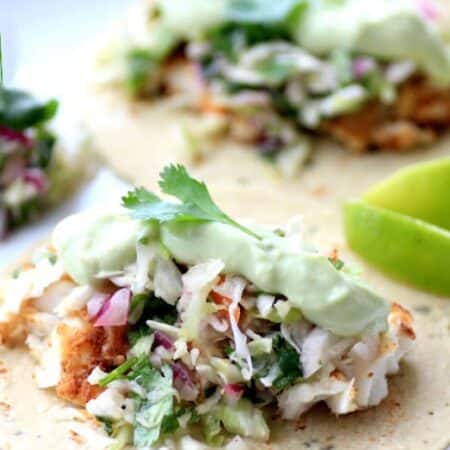 Avocado Cream Slaw Fish Tacos hero.