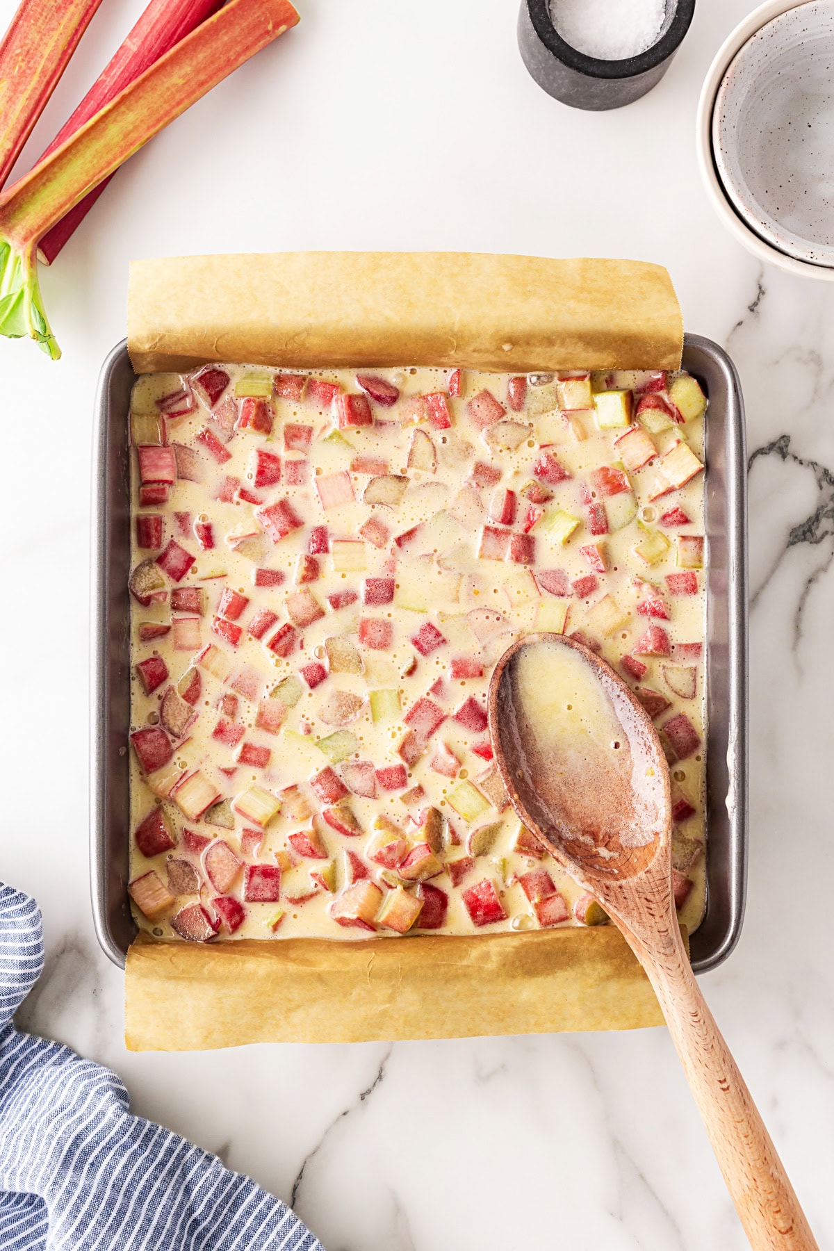 Rhubarb Dream Bars are the perfect rhubarb lover's treat! They are rich and gooey, tart and sweet and make for an exquisite dessert with little effort. Filling added to crust.