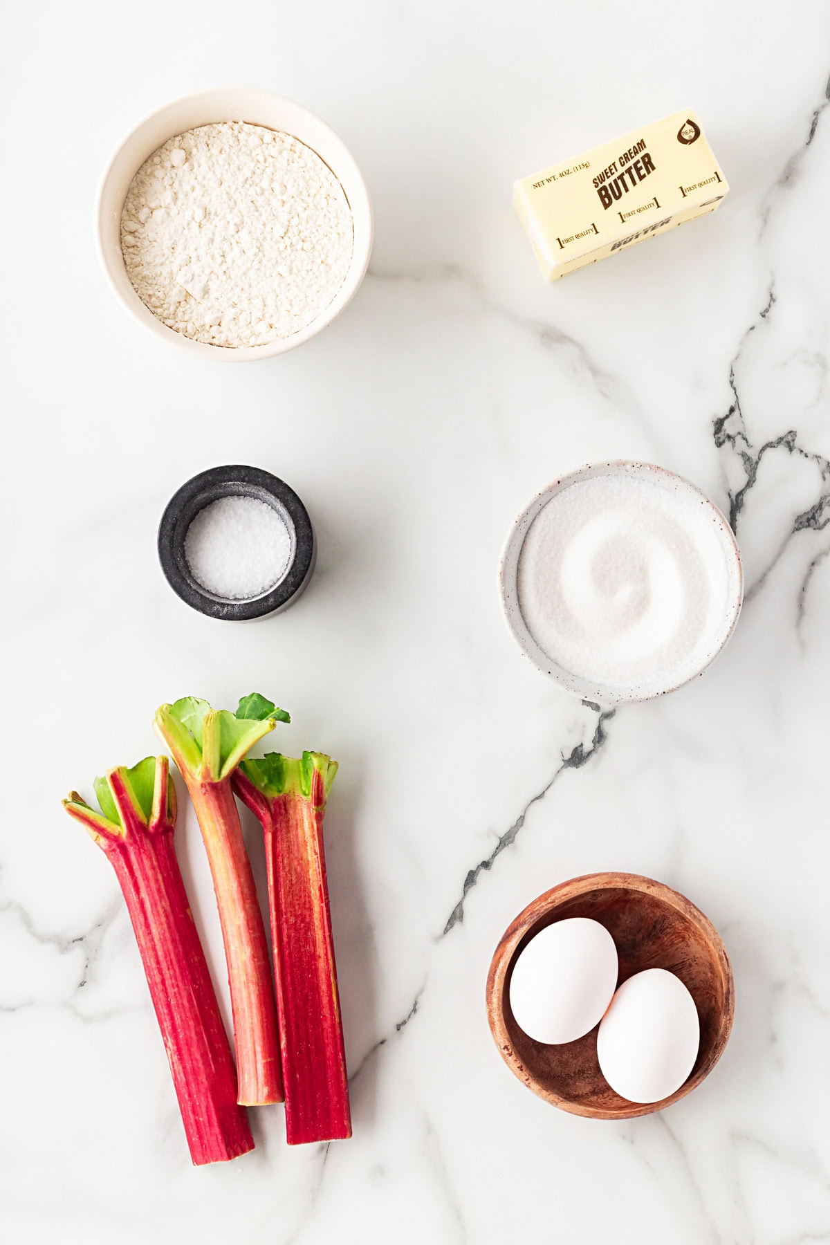 Rhubarb Dream Bars are the perfect rhubarb lover's treat! They are rich and gooey, tart and sweet and make for an exquisite dessert with little effort. Recipe ingredients.