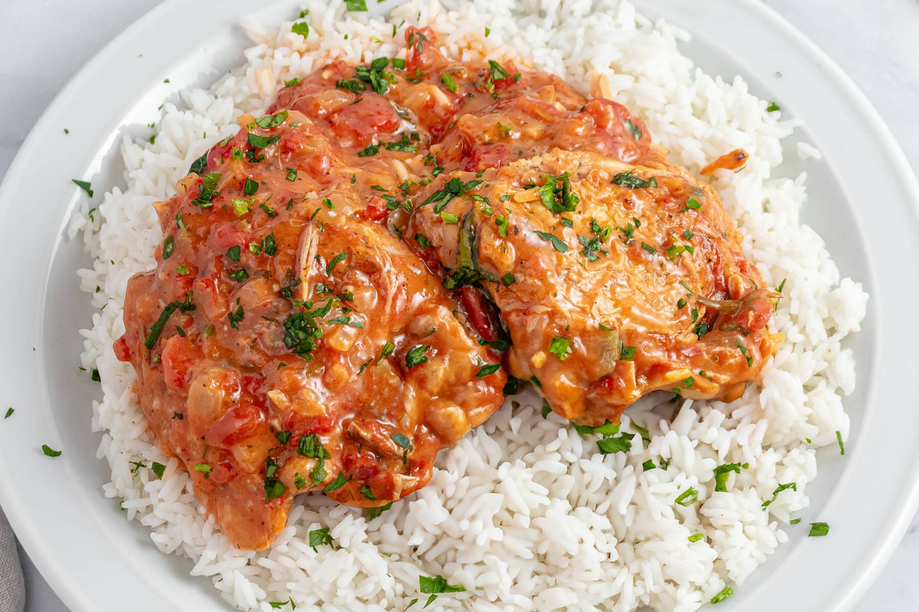 Horizontal picture of Chicken Marengo on rice. 