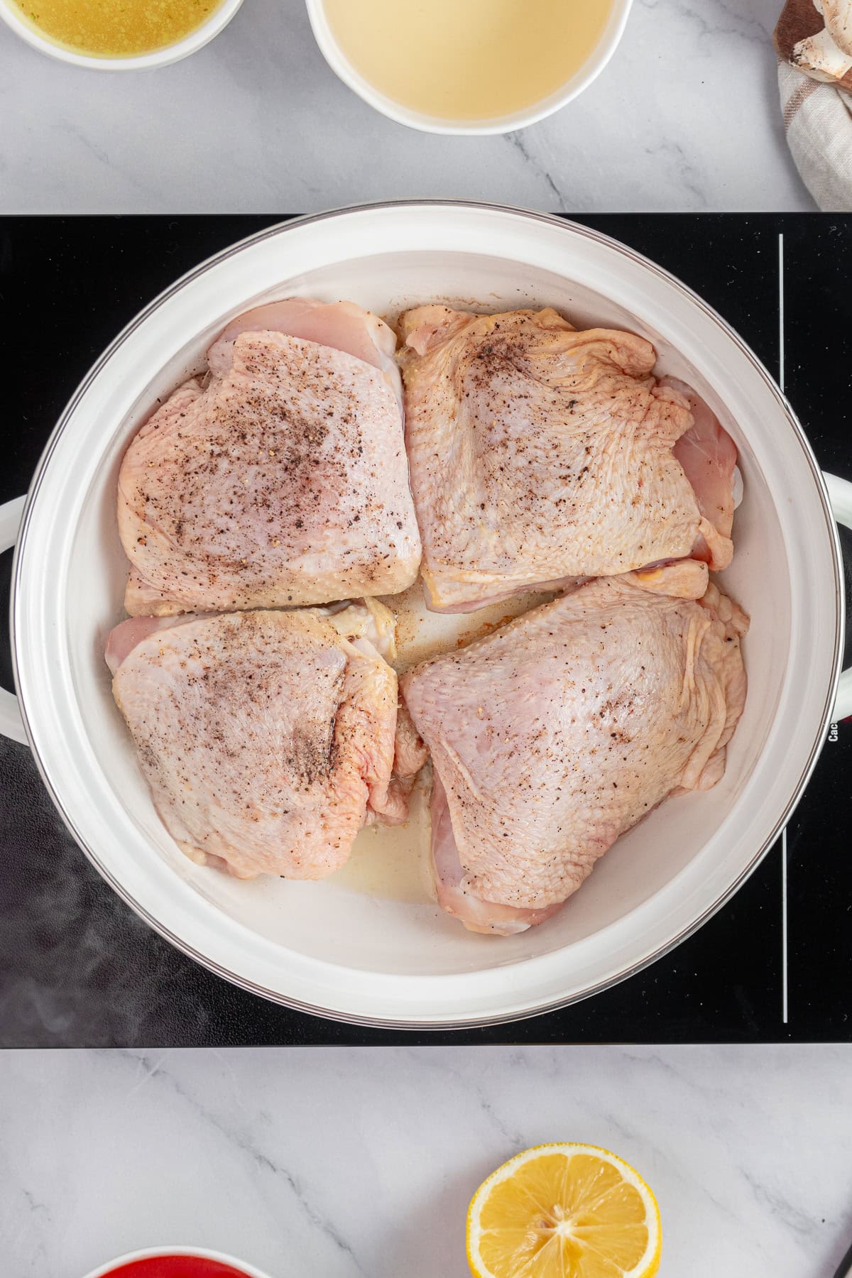 Searing chicken thighs.