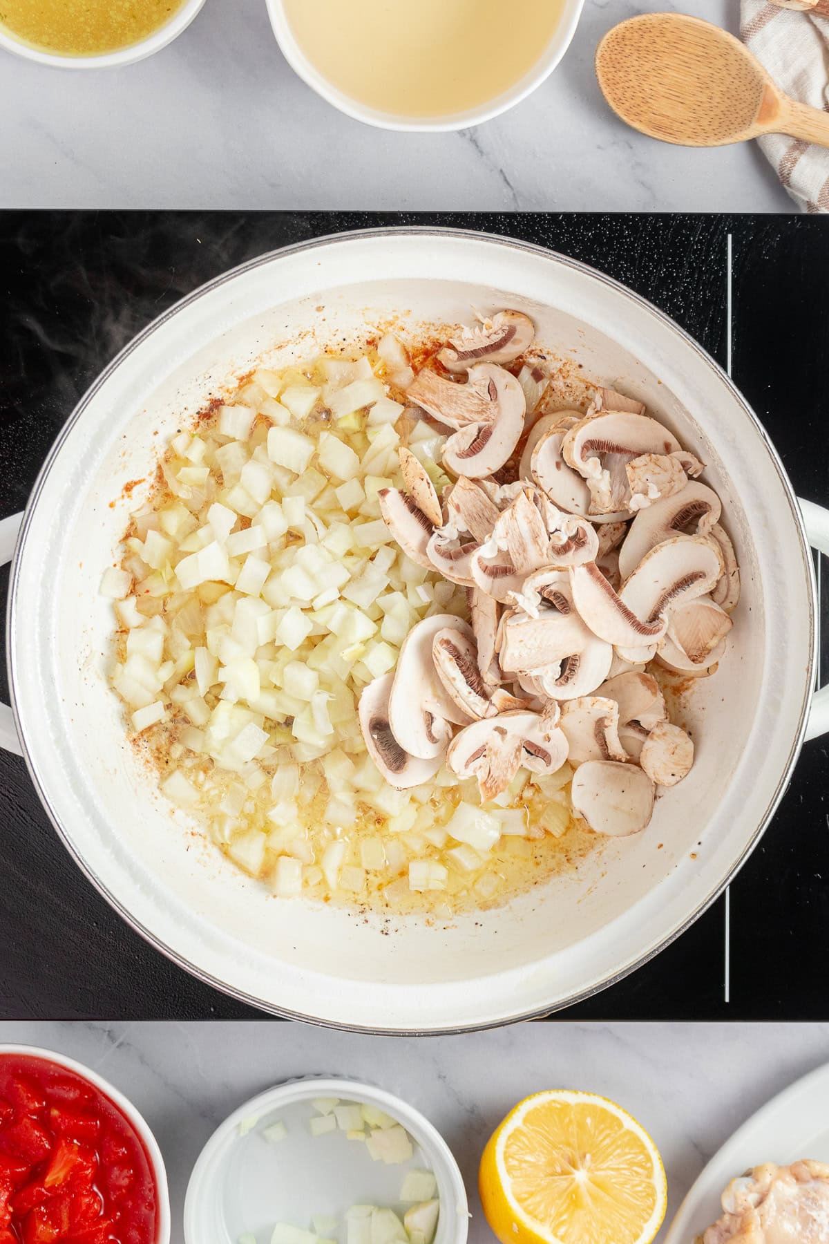 Sauteing onion, garlic and mushrooms.