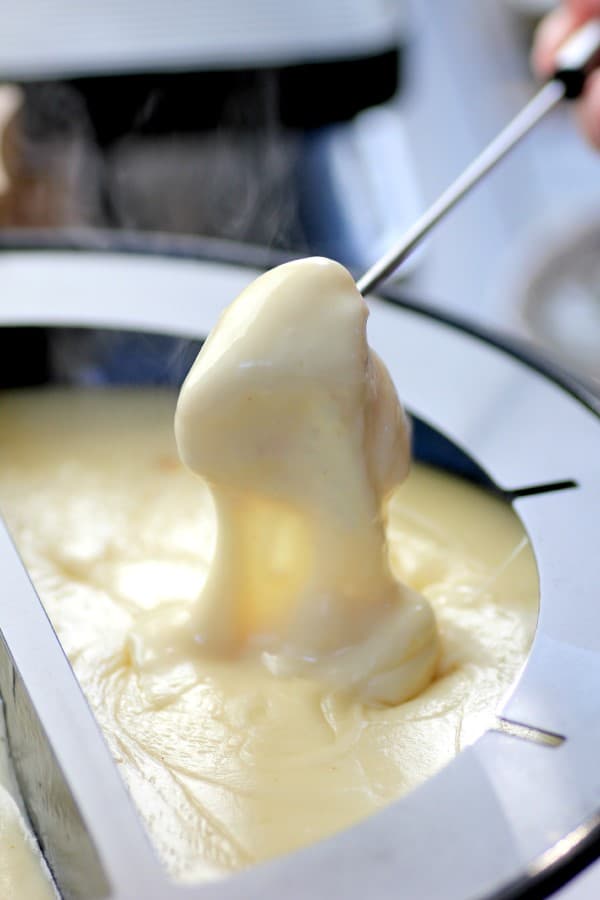 Emmentaler-Gruyere Fondue with Roasted Garlic by Noshing With The Nolands 