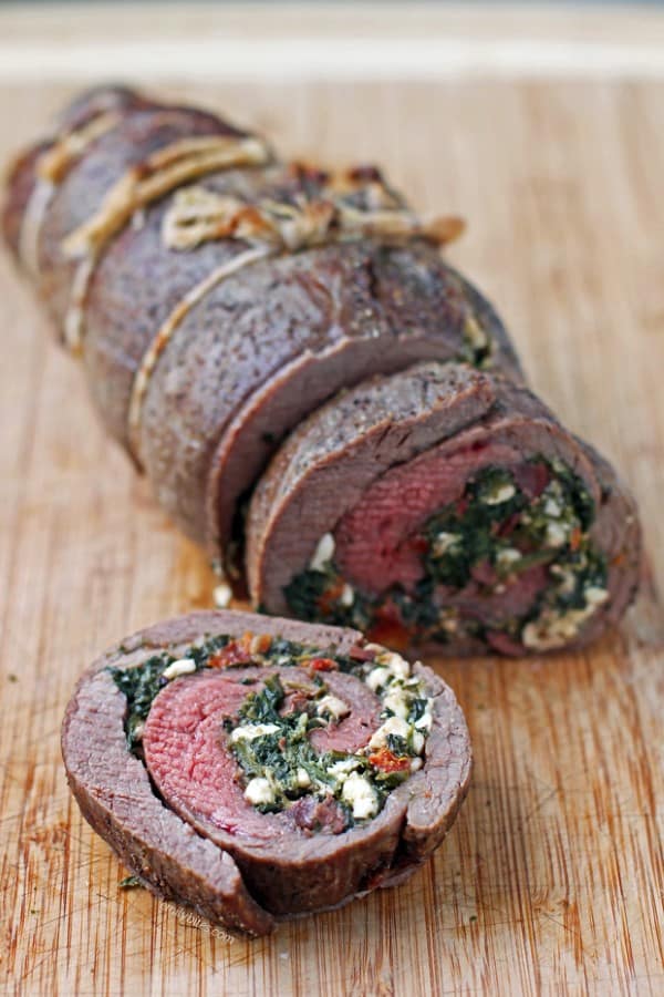 Spinach and Feta Stuffed Flank Steak by Emily Bites