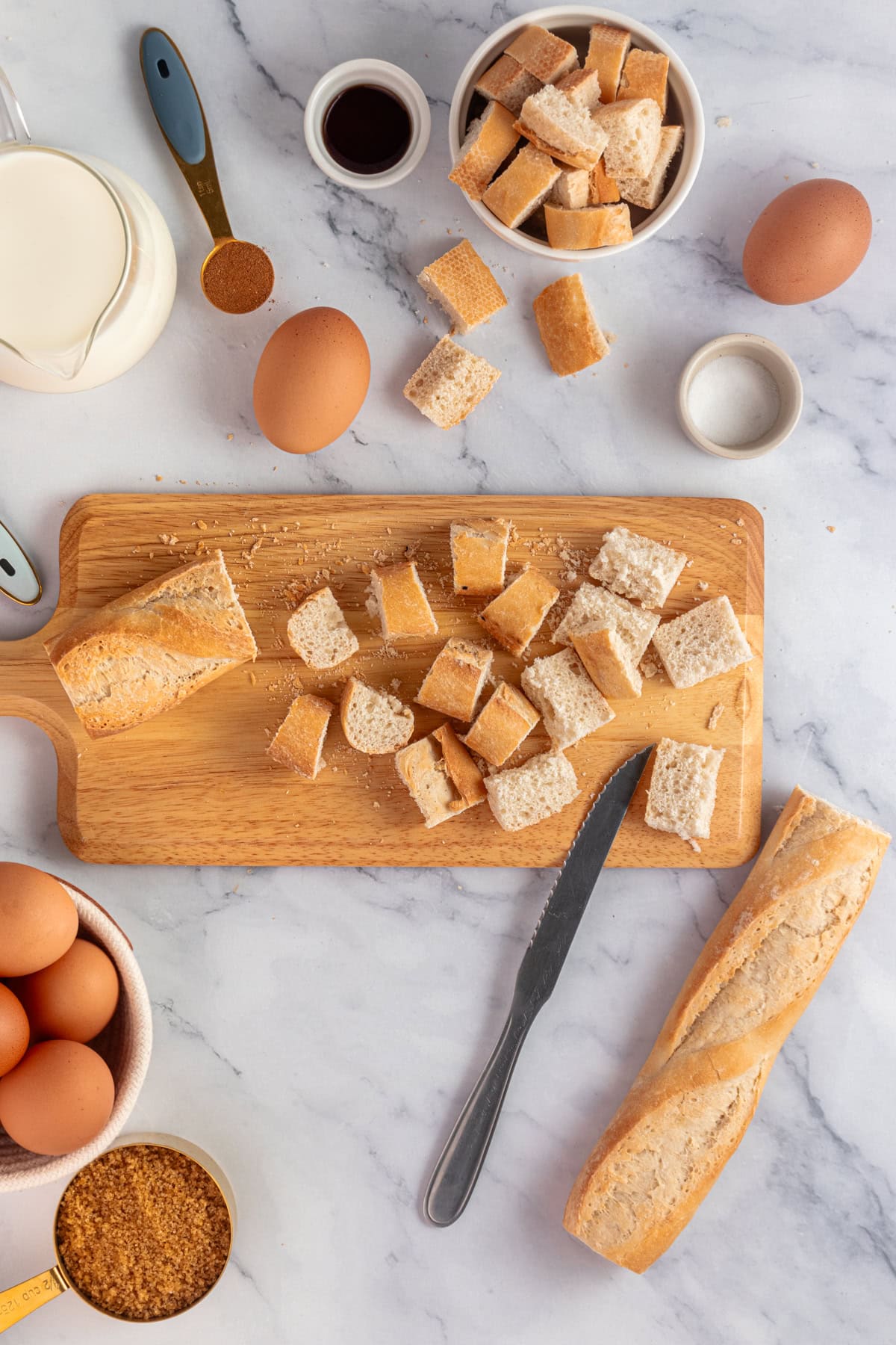 Chopping bread on a wooden board.