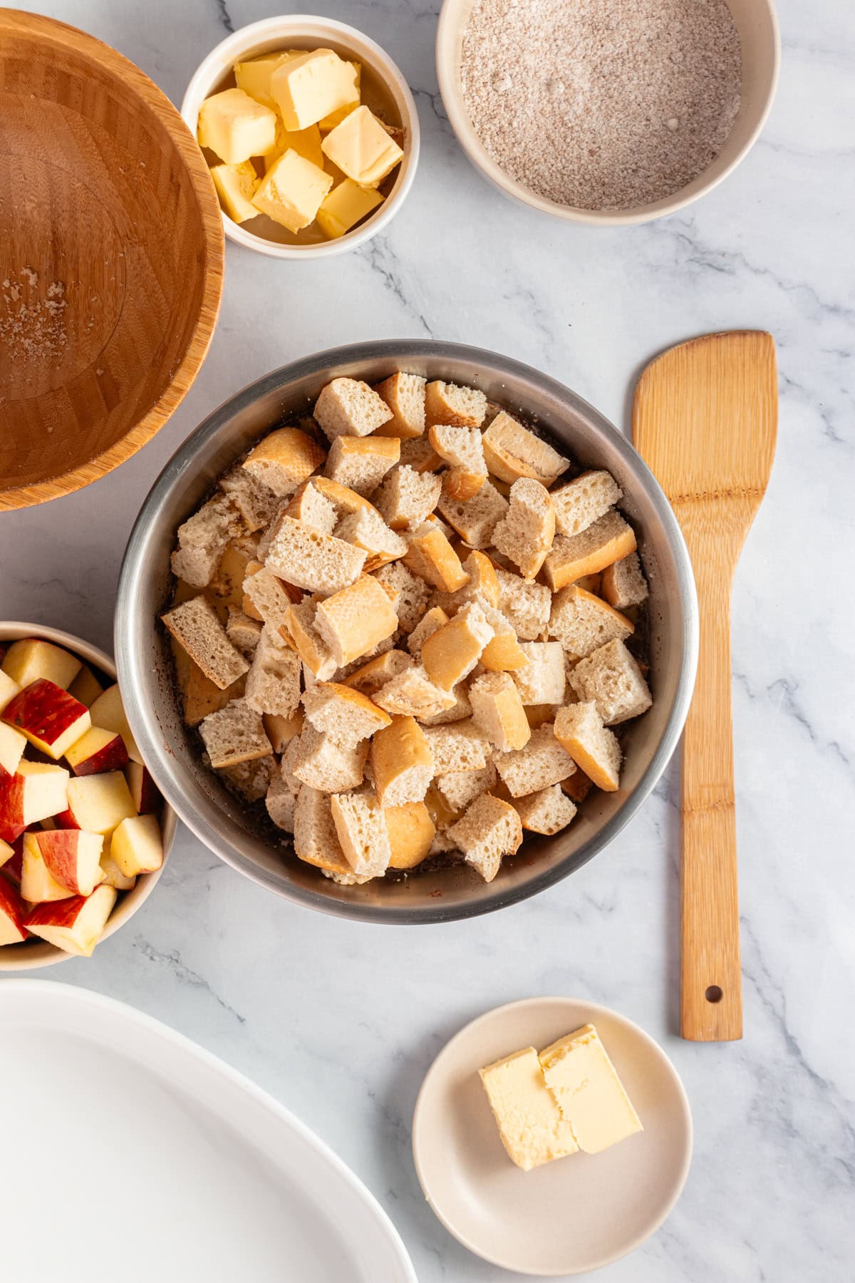 Place chopped bread into a mixing bowl.