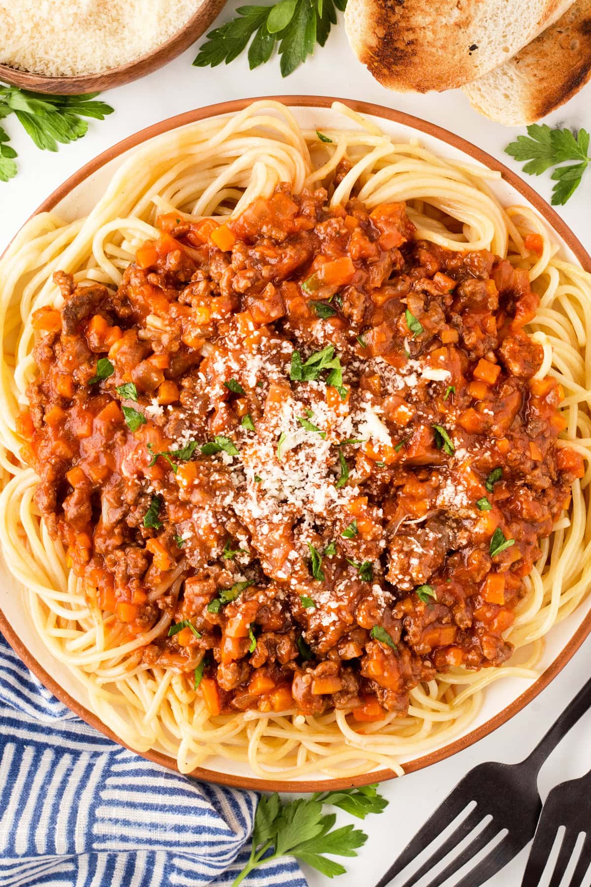 Overhead shot of plate of spaghetti with instant pot spaghetti sauce on top.