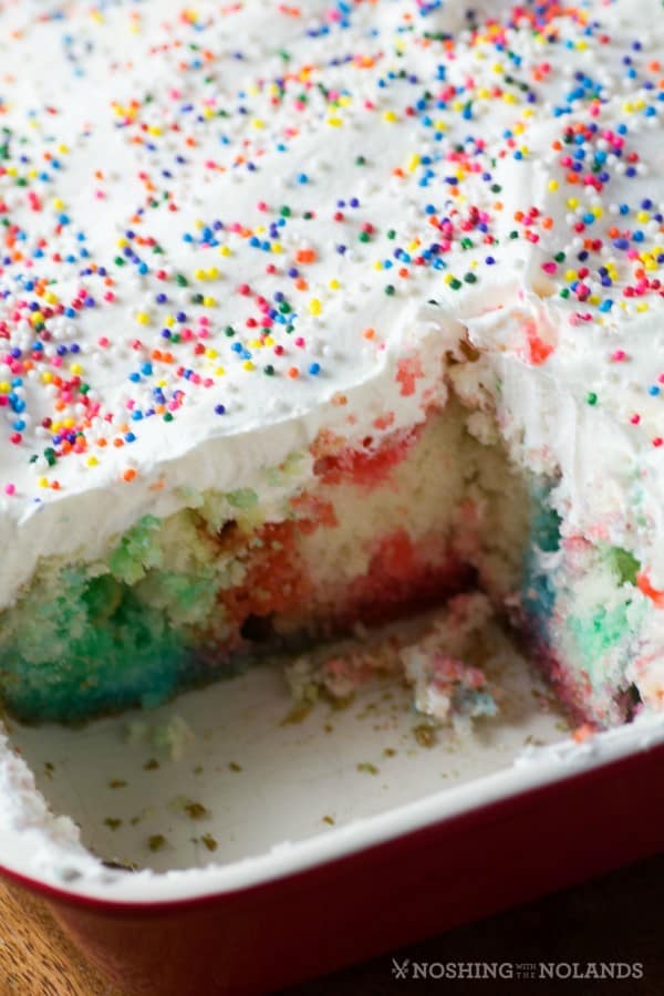 Rainbow Birthday Poke Cake pan with a square taken out