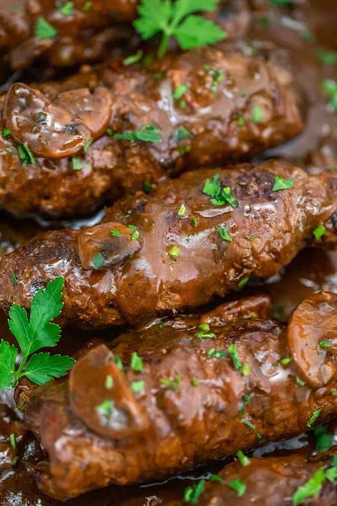 Beef Rouladen rolls in a mushroom gravy with cilantro