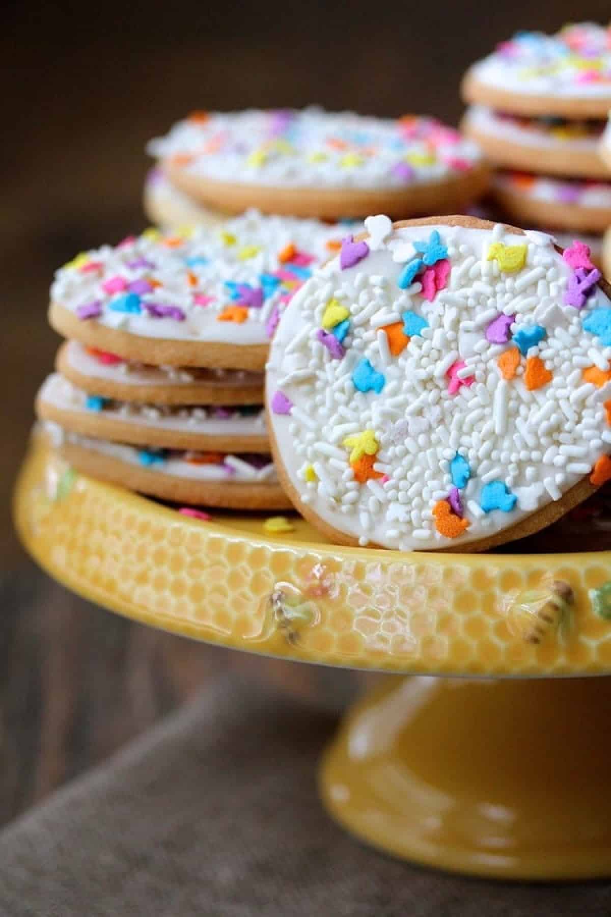 Easter Egg Cookies stacked on a platter.
