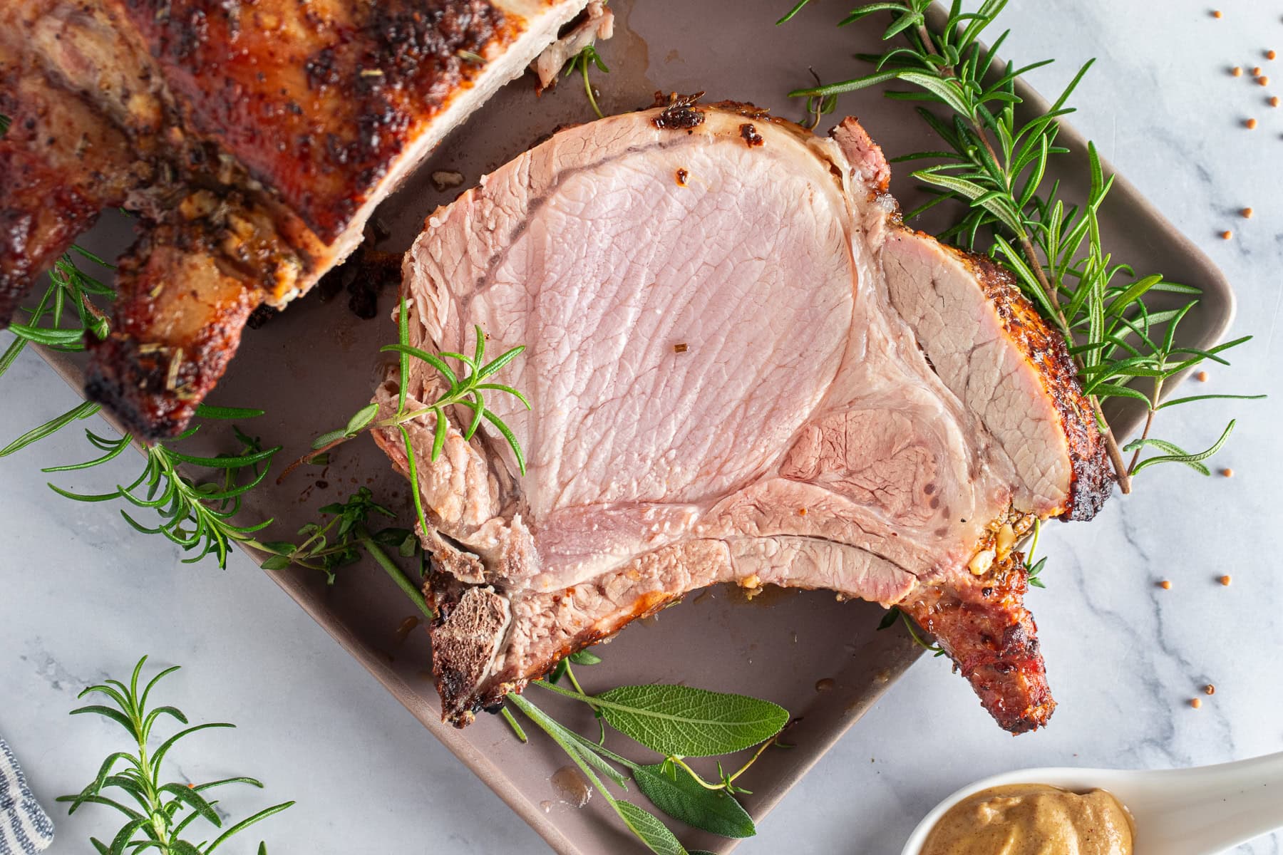 Pork rib roast with fresh herbs.