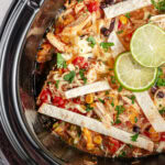 Overhead shot of crock pot tortilla soup still in the machine.