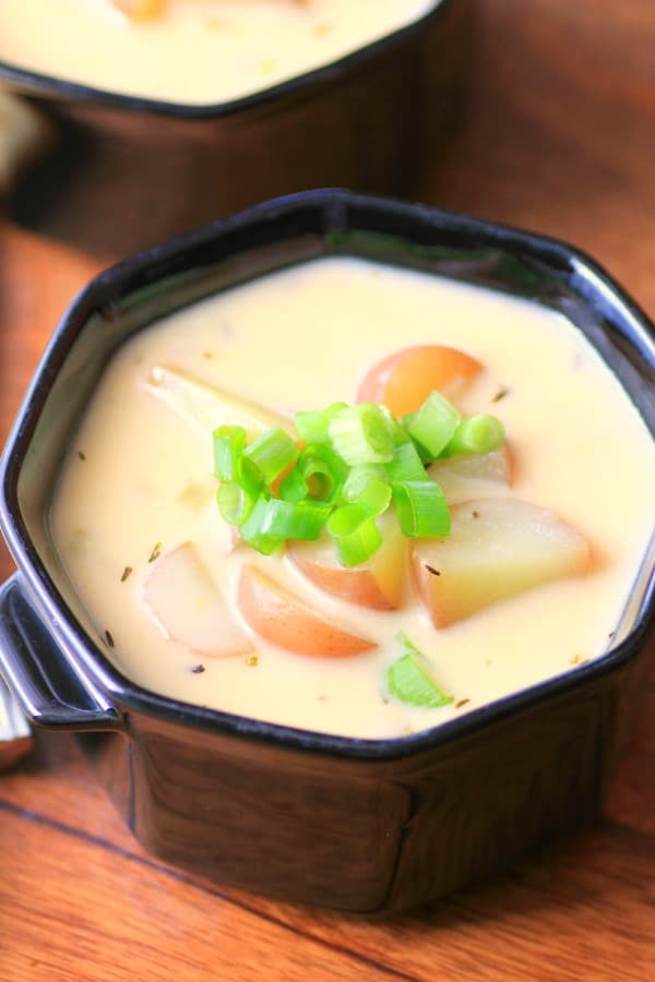 Cheesy Potato Soup in black bowls