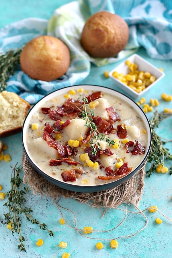 Corn Chowder in a bowl on a blue background