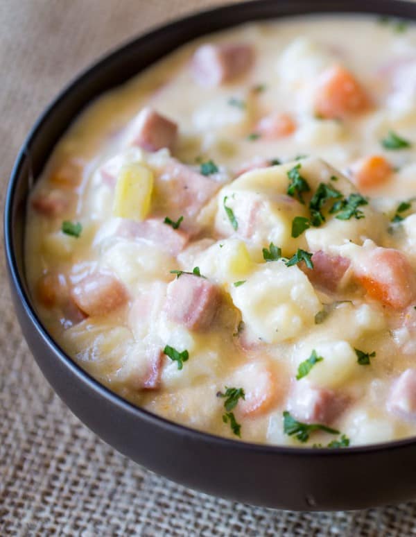 Ham and Potato Soup in a black bowl