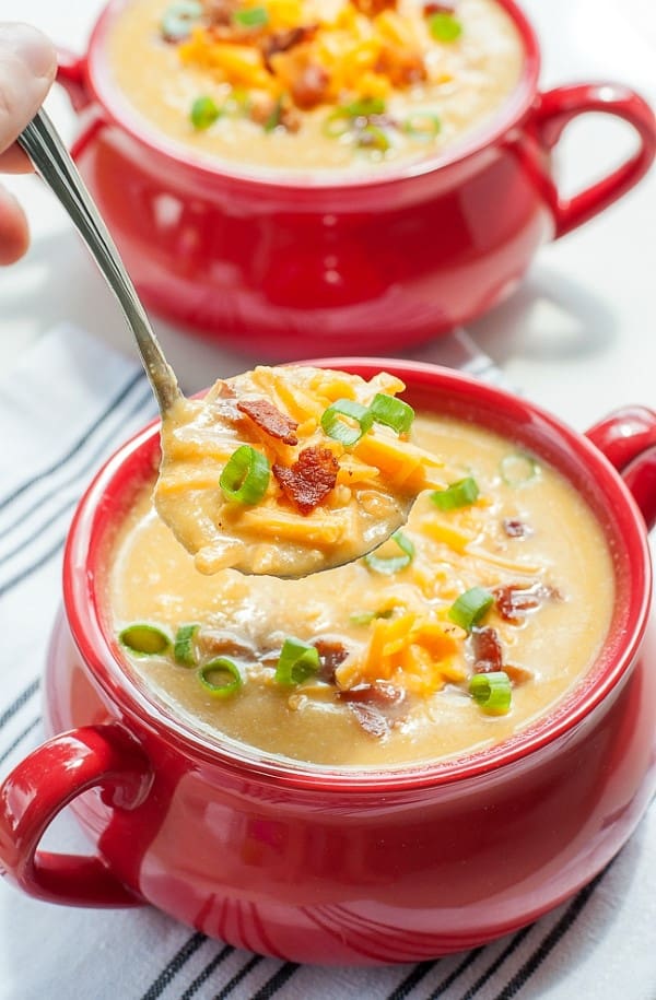 Sweet Potato and Cauliflower Soup in red bowls