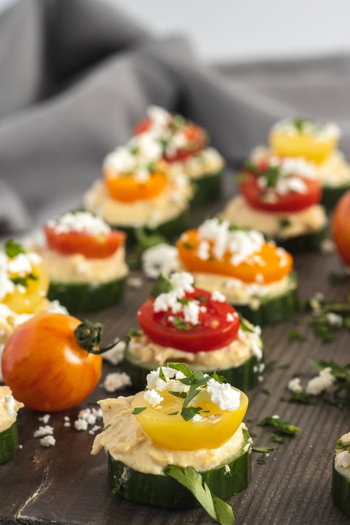 Cucumber bites on serving tray.